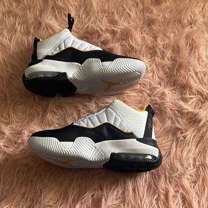 yellow and black jordan’s